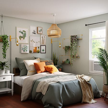 Bedroom with cool green towns and pops of orange accents