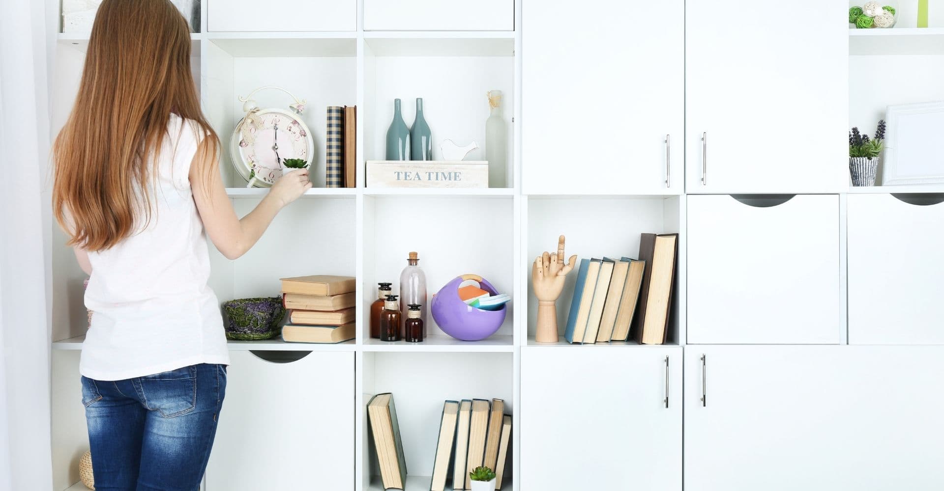 A woman organizing shelves