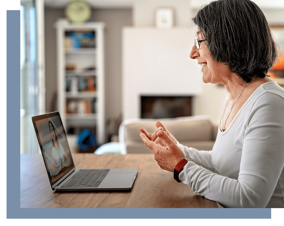 Counselor talking to patient over online meeting